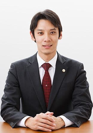 柏事務所所長　弁護士　川崎 翔