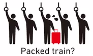 満員電車にスーツケース？